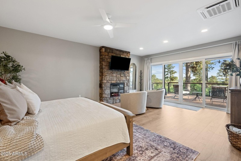 Primary Bedroom with Fireplace and Views