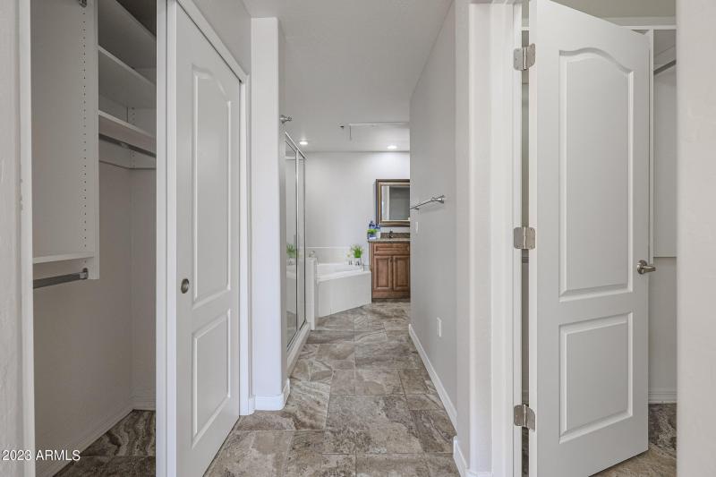 two closets for primary bedroom