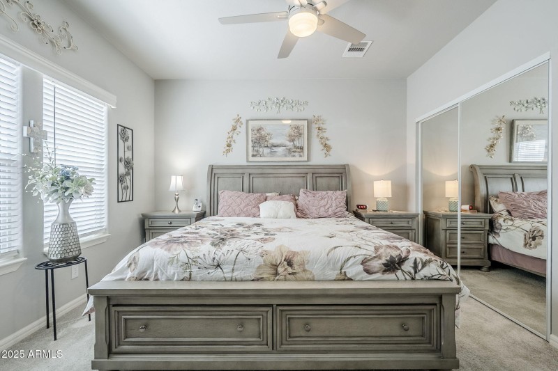 Oversized primary bedroom with king bed