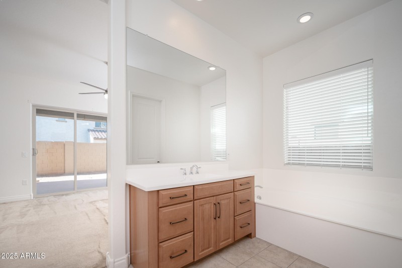 PRIMARY BATHROOM TO BEDROOM