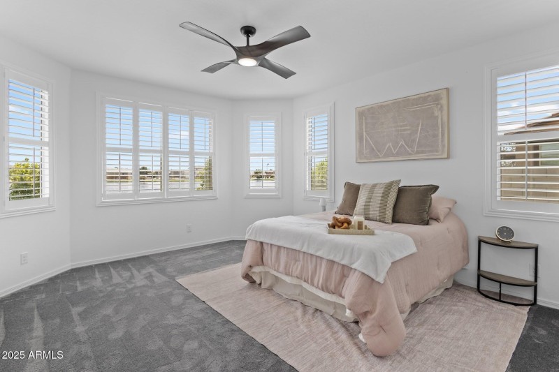 Primary bedroom w/lake views