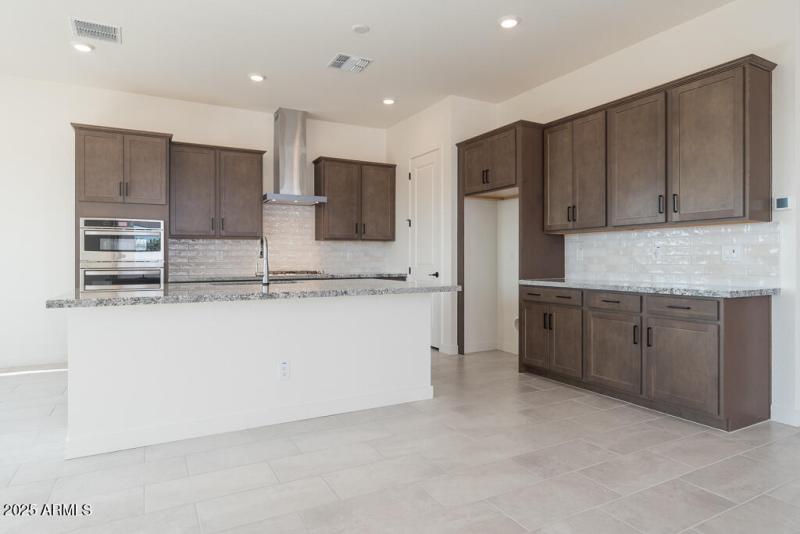 Tri Pointe Soleo 649 - Kitchen-1MLS