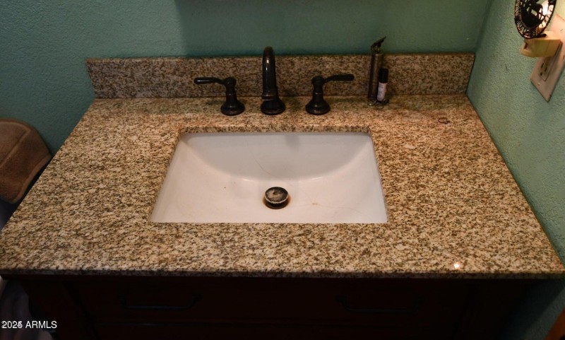 Redone bathroom with granite counter