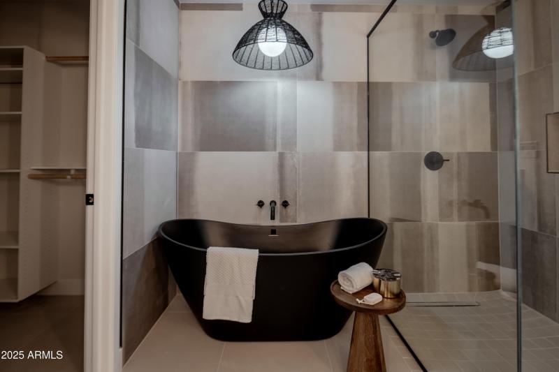 Primary Bathroom w/ Black Soaking Tub