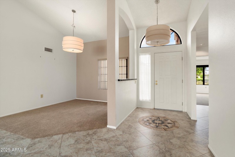 FRONT ENTRY & FORMAL DINING ROOM