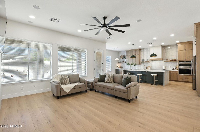 Great room features brand-new flooring