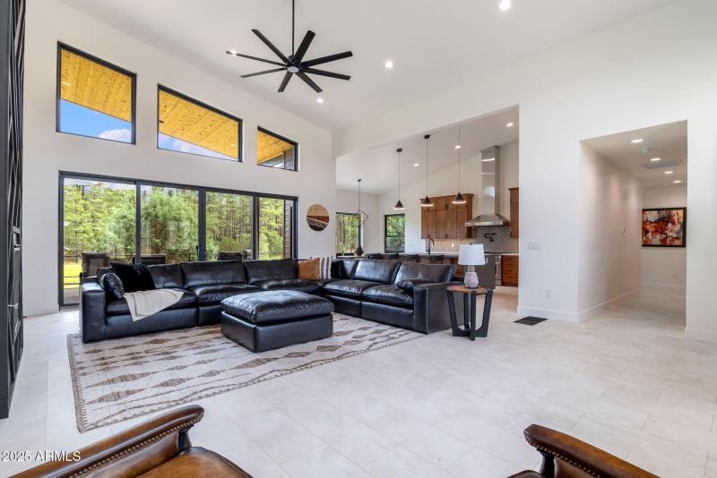 Living room and view into kitchen