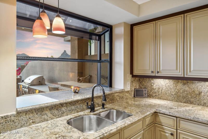 Kitchen sink with Pinnacle Peak views