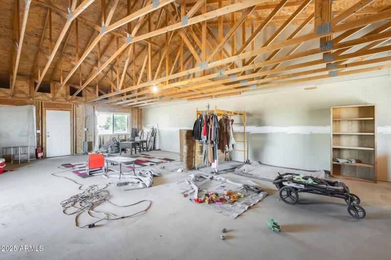 Unfinished half with front door