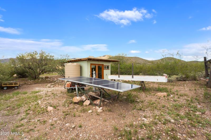 Solar panels in fron of well house