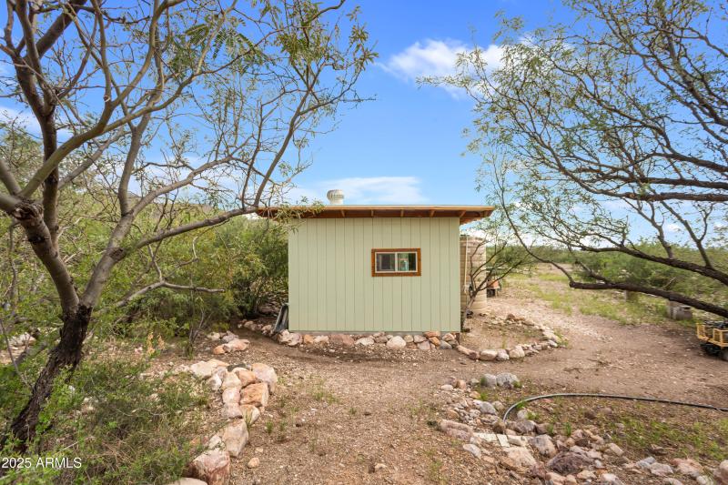 Well house, battery house and workshop