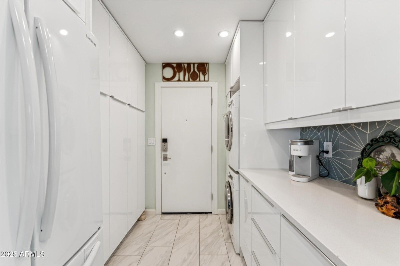 Laundry w/ Storage and Counter Space