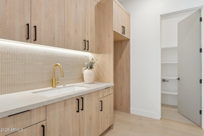 Laundry with walk in pantry