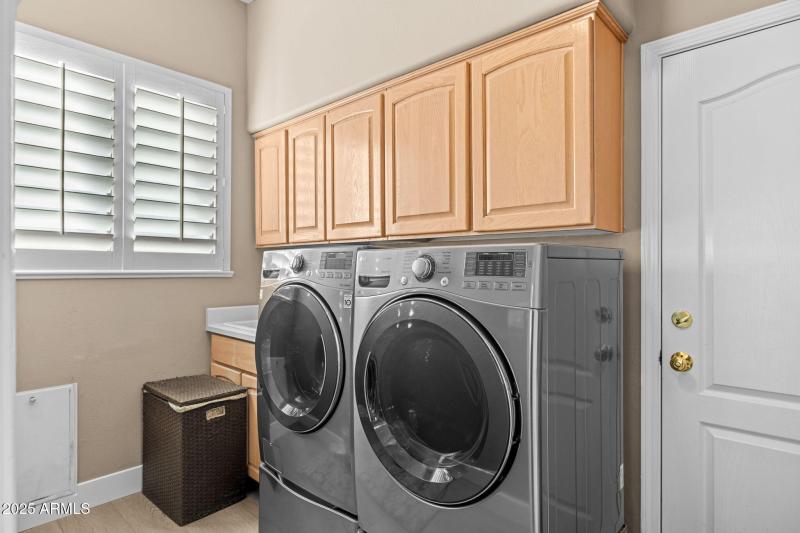 Laundry room with sink