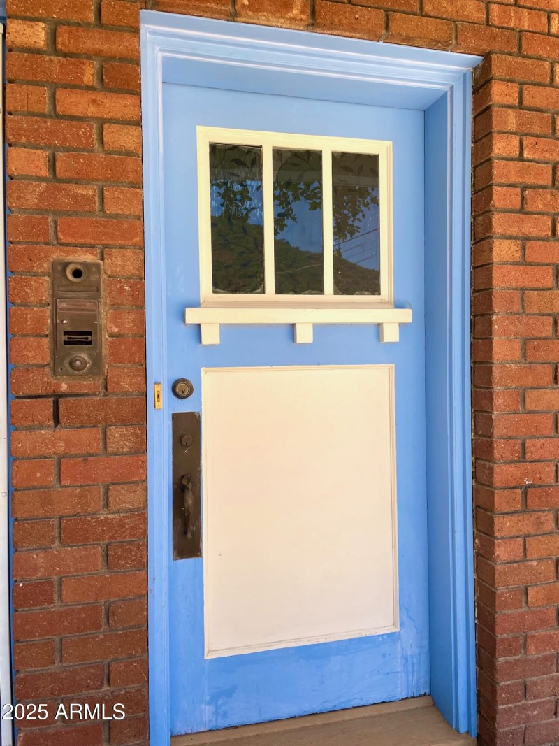 Door to Apt A - upstairs