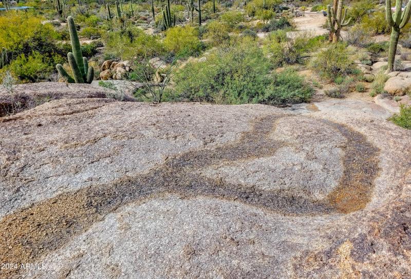 water trickles to the edge of the waterf