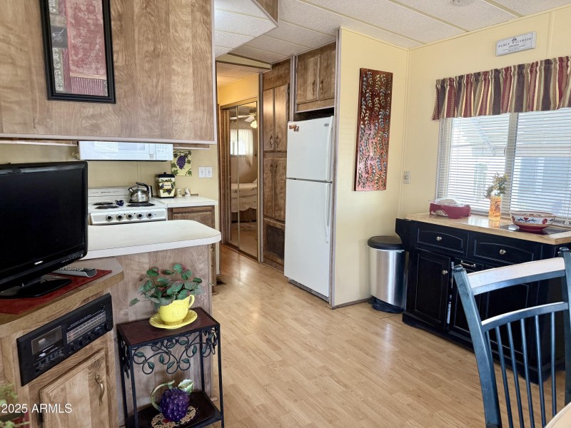 7750 E. BROADWAY RD. #123