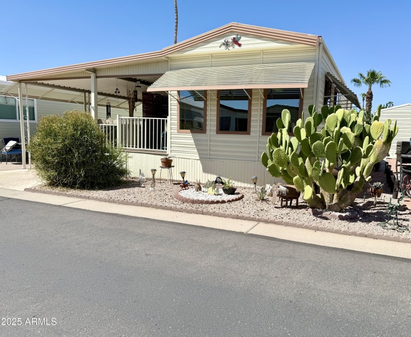 7750 E. BROADWAY RD. #123
