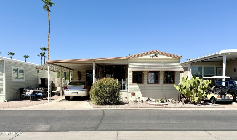 7750 E. BROADWAY RD. #123