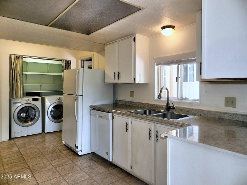 Kitchen w/ W/D Area