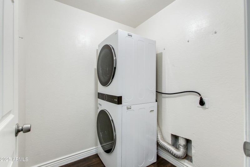 Laundry room located downstairs