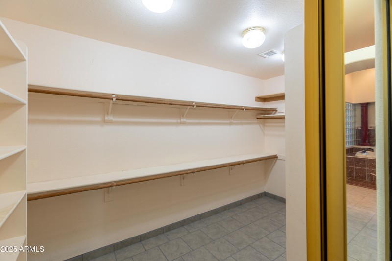 "Her" Walk-in Closet