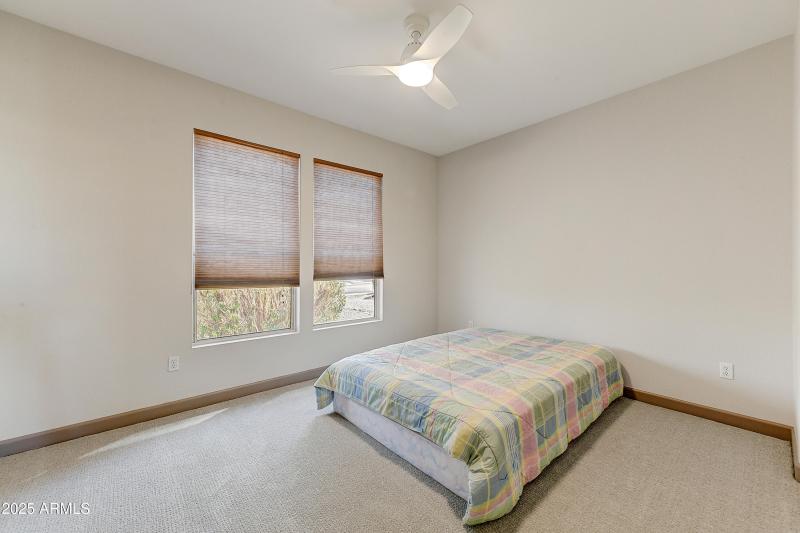 Bright Bedroom with Dual Windows