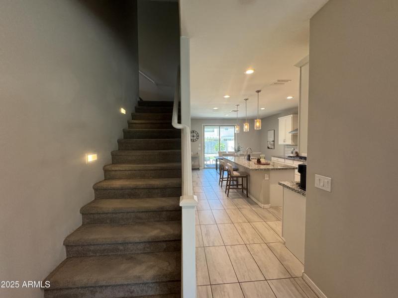 Entry with Stairway & Kitchen View