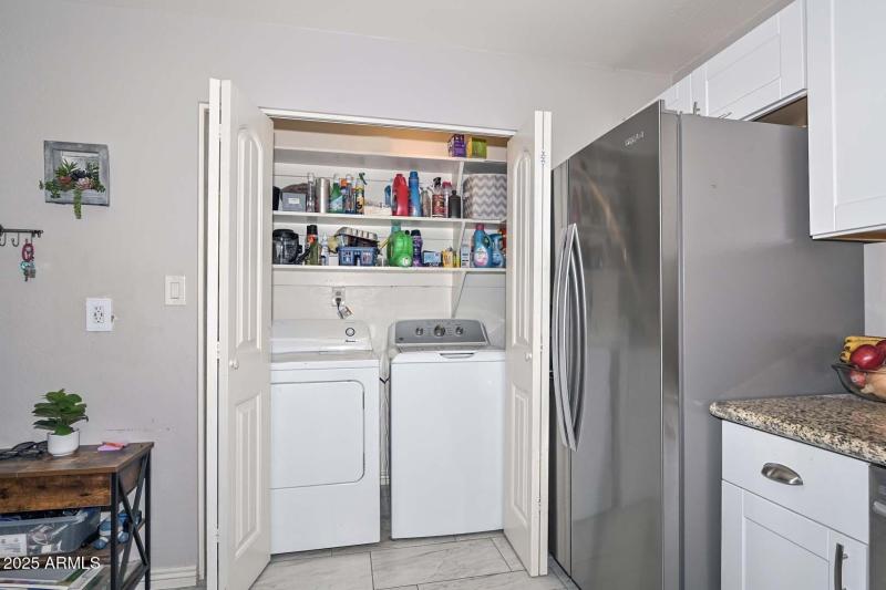 Laundry Closet with Storage Shelves