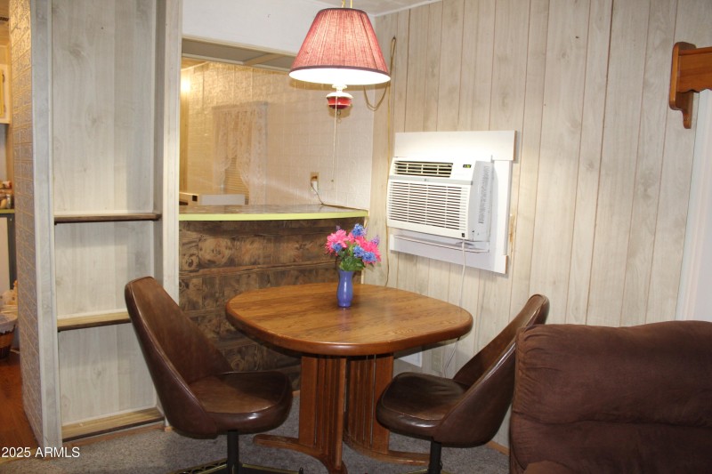 Dining, built in bookshelves, bar