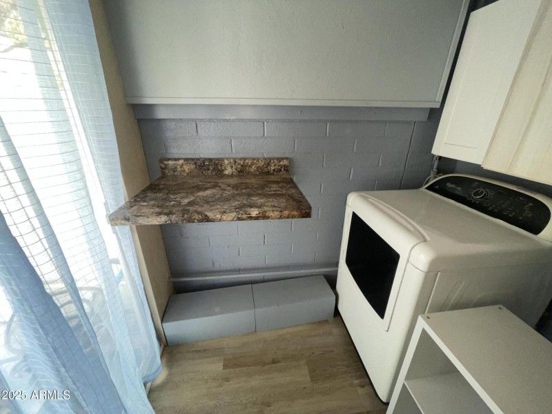 Built-in counter to fold your laundry.