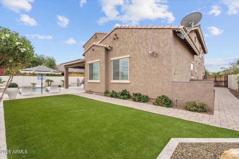 Pavered Walk To Double Gate