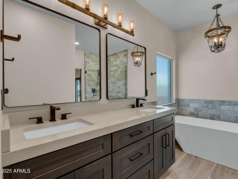 032_primary suite dual vanities