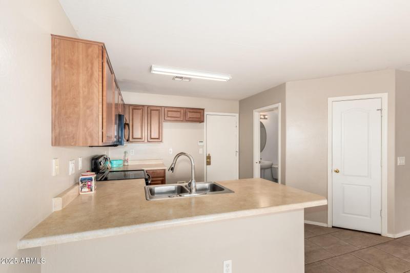 Door to Garage & Downstairs Bathroom