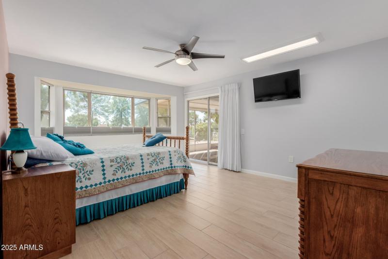 Primary bedroom with golf course views