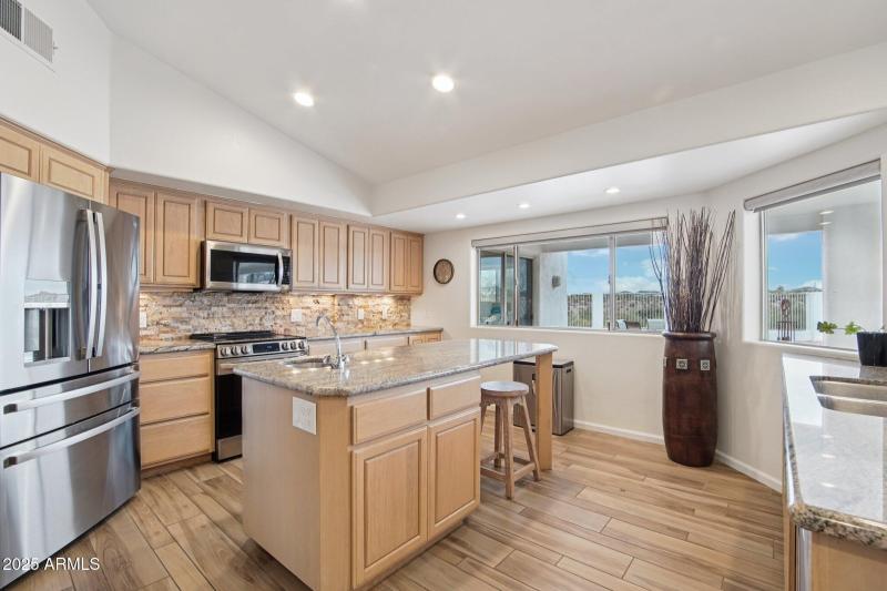 Kitchen, breakfast bar & views