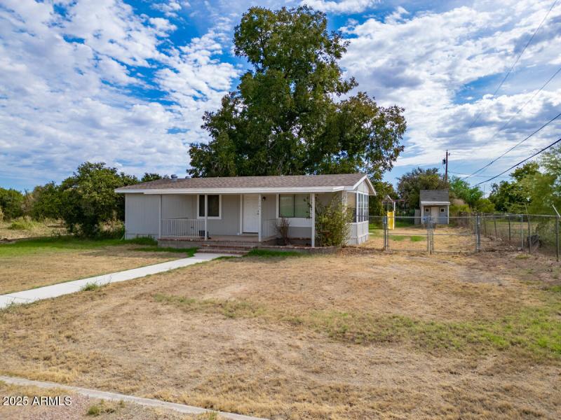 mobile home at corner of property