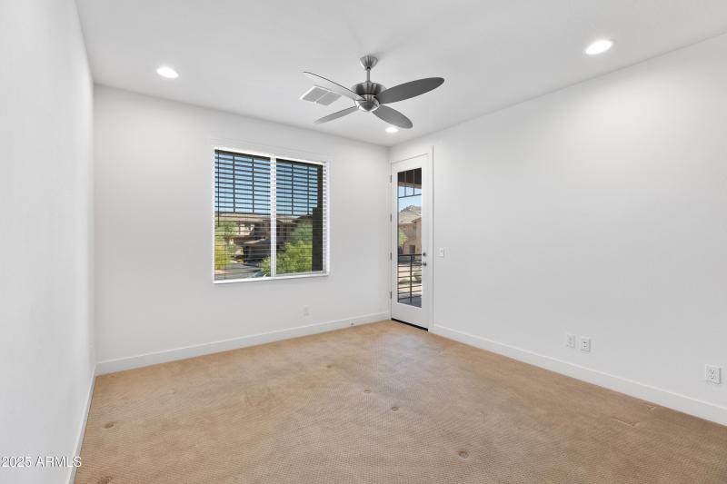 Primary Bedroom w/ Access to Balcony