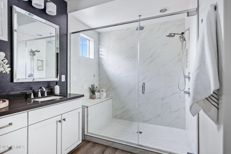 Huge walk-in shower in primary bathroom
