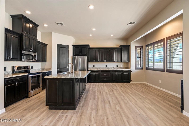 Lots of cabinets in kitchen
