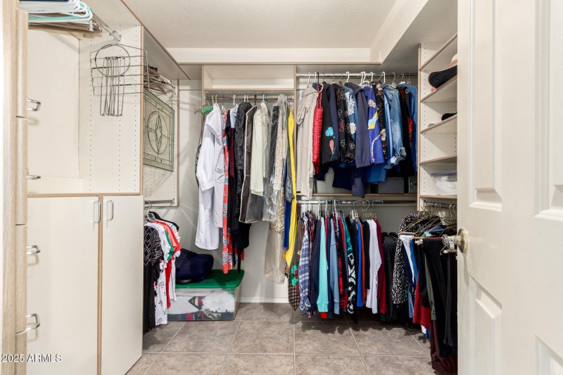 28 Primary Walk-in Closet