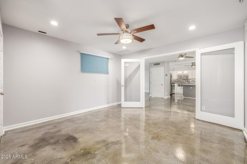 Den or 5th bedroom with french doors