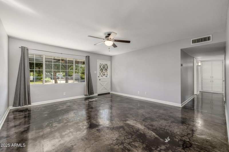 Living room with view of hallway