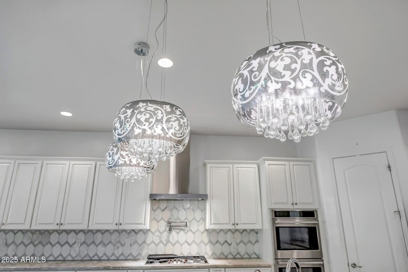 PENDANT LIGHTS OVER ISLAND
