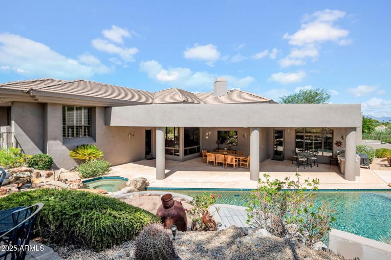 BACKYARD + OVERSIZED COVERED PATIO & OUT