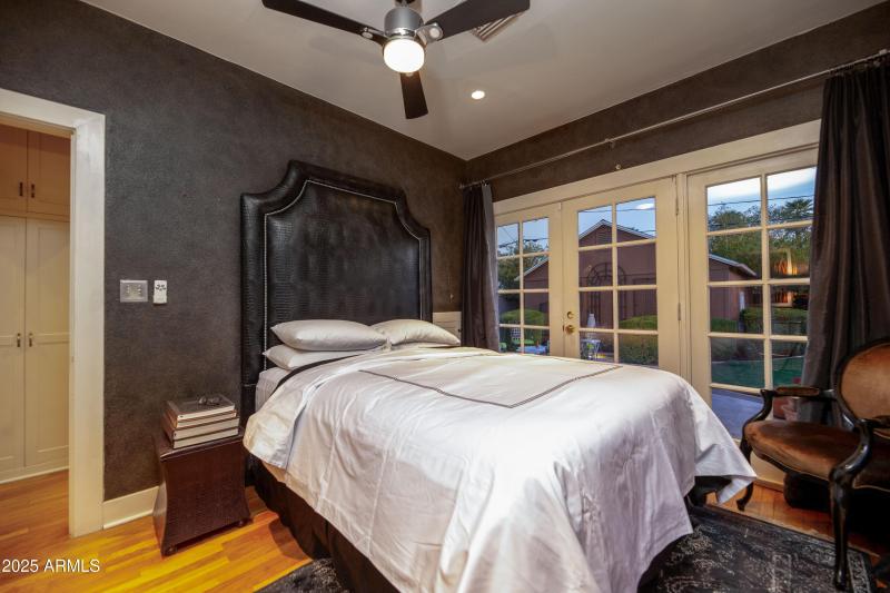 Primary bedroom w/ French doors to back