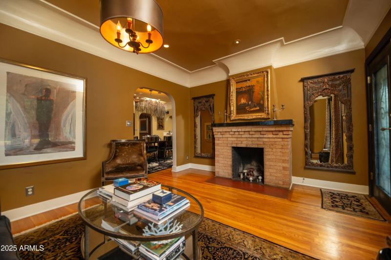 Front living room w/ brick fireplace