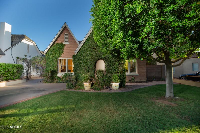 Red brick Tudor w/ creeping fig