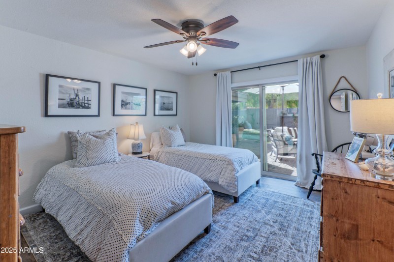 Guest bedroom has patio access