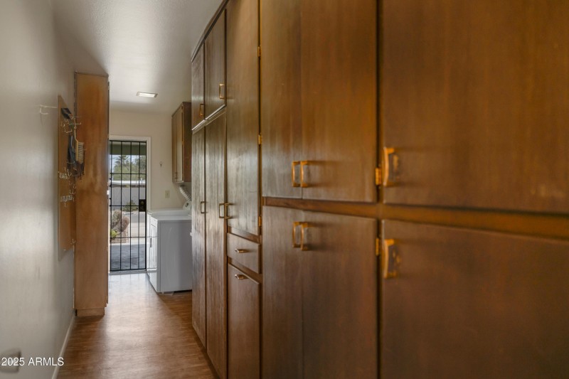 Expansive storage to double carport.